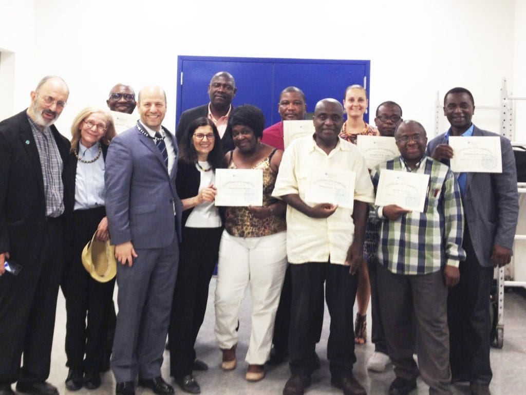 At the conclusion of the final training session, the MBBI-NY – CUNY team awarded attendees with Certificates of Completion, and members of ULAA gave Liberian necklaces and dashikis to the trainers.
